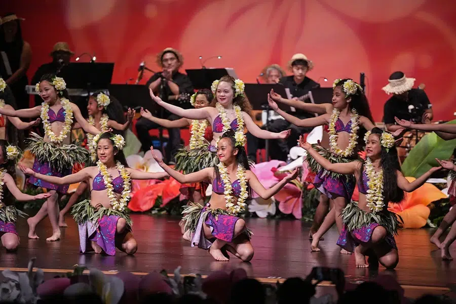 spark of creation hula on stage in purple happy girls group