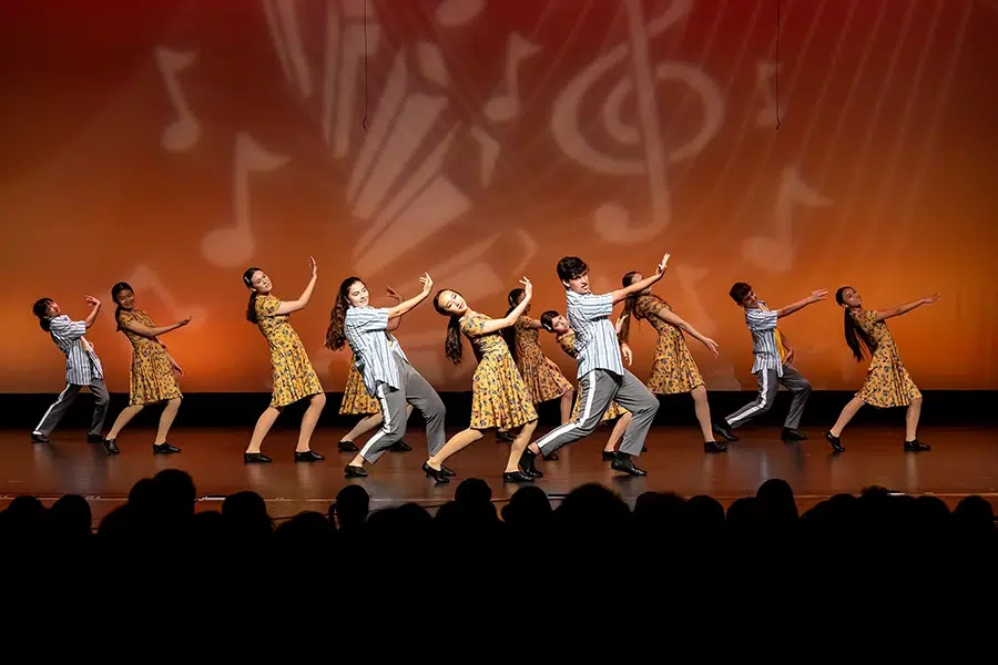 spark of creation jazz teens on stage yellow outfit